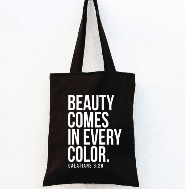 beauty comes in all colors black tote bag